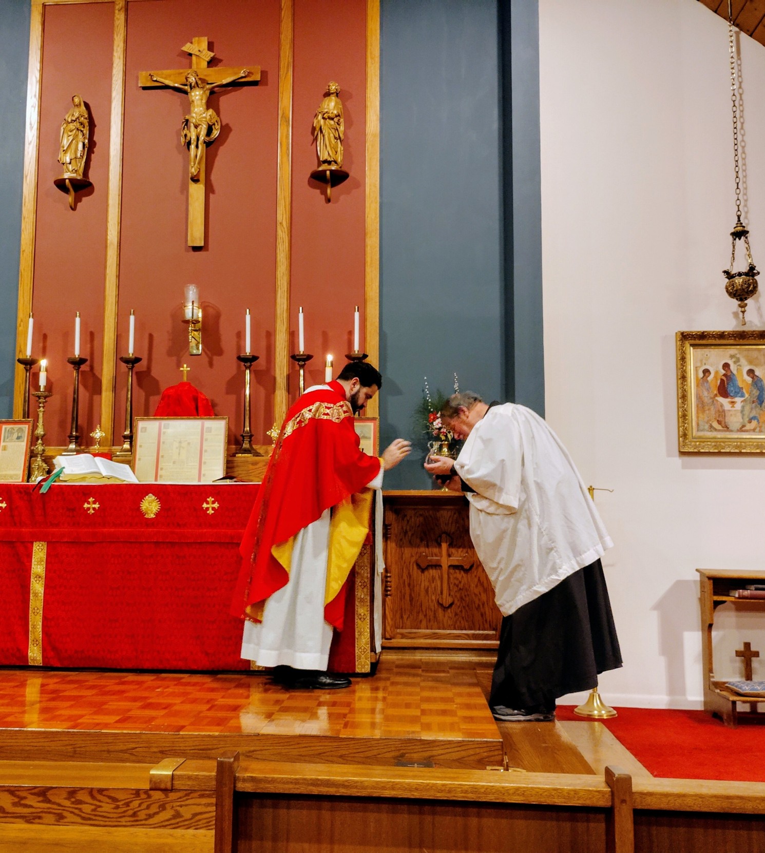Fr Gabriel at Alter with Reader David Blessing the wine during the Divine Liturgy